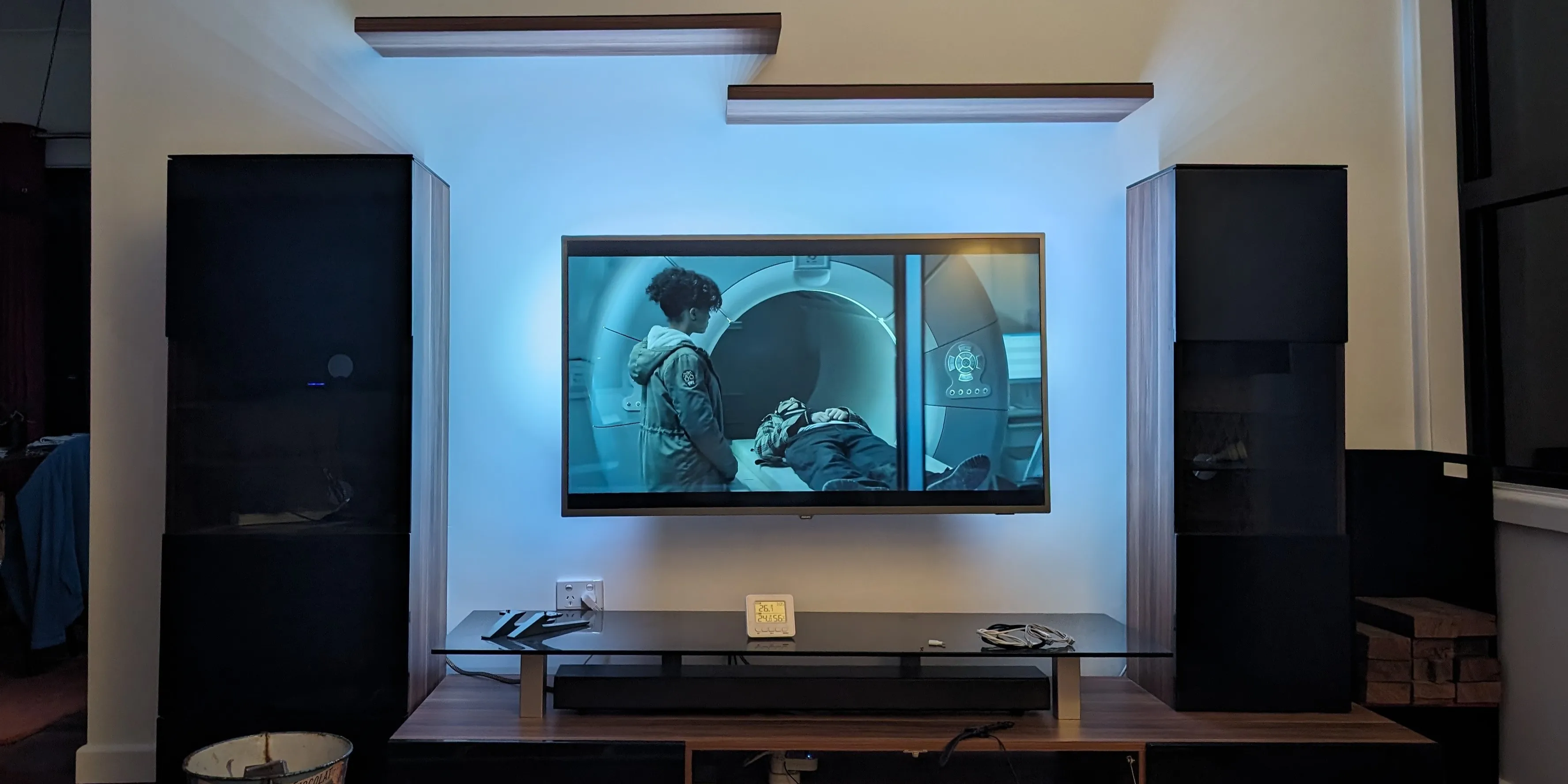 a wall-hung TV & cabinets