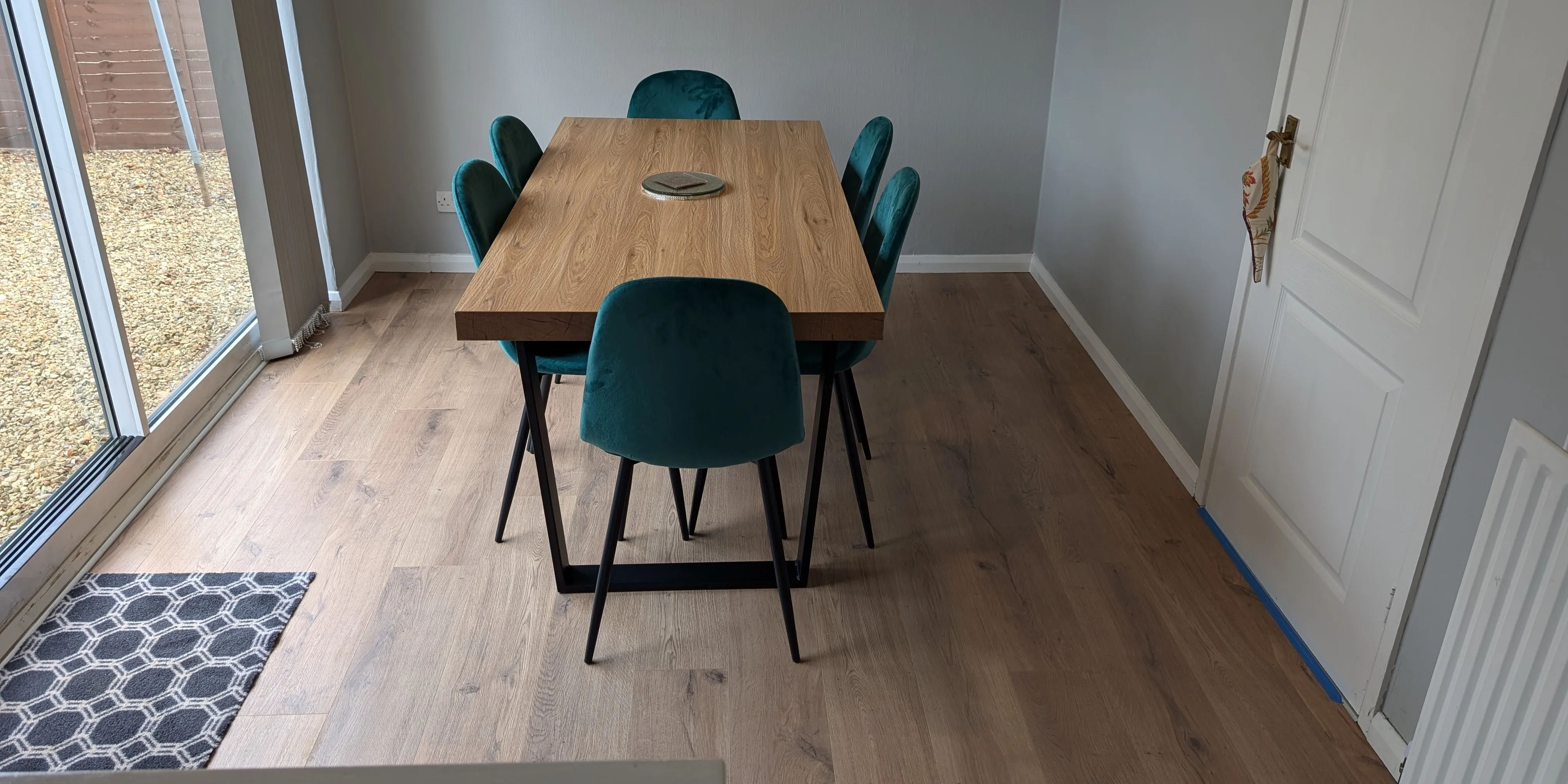 a dining room after floor replacement